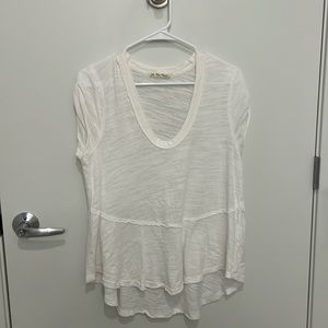 We the Free fashion tee, short sleeves, long tail, very fashionable with jeans